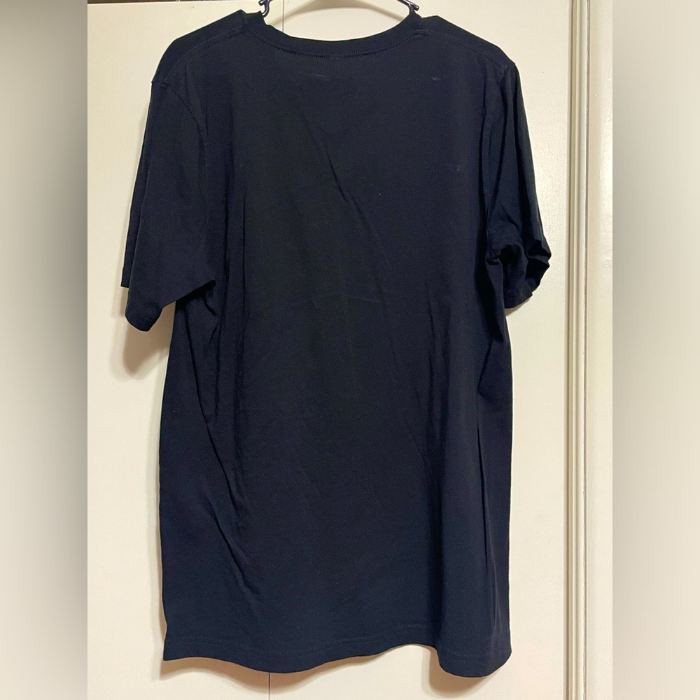Women’s V neck tee. 100% cotton.